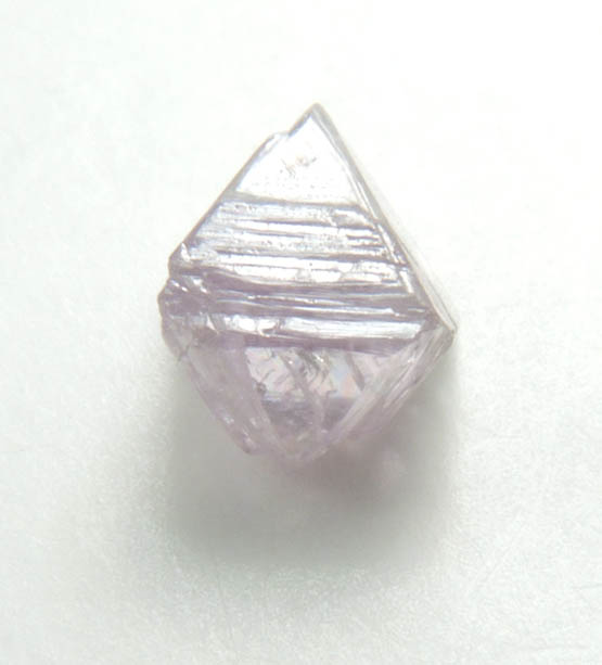 Diamond (0.42 carat bi-colored colorless-pink octahedral crystal) from Argyle Mine, Kimberley, Western Australia, Australia
