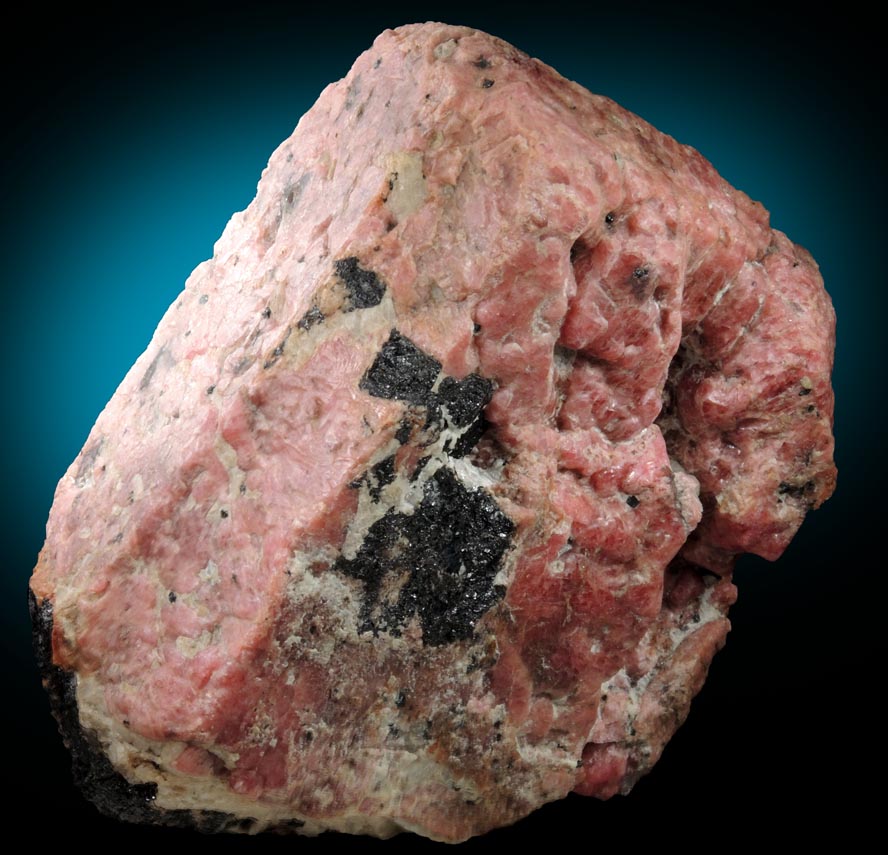 Rhodonite with minor Franklinite, Calcite, Willemite from Franklin, Sussex County, New Jersey