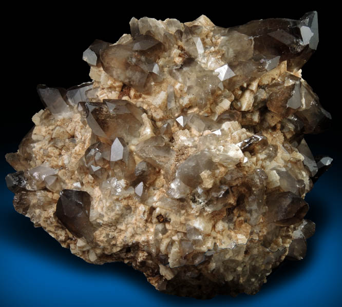 Quartz var. Smoky Quartz (Dauphin-law twins) on Microcline from Moat Mountain, west of North Conway, Carroll County, New Hampshire