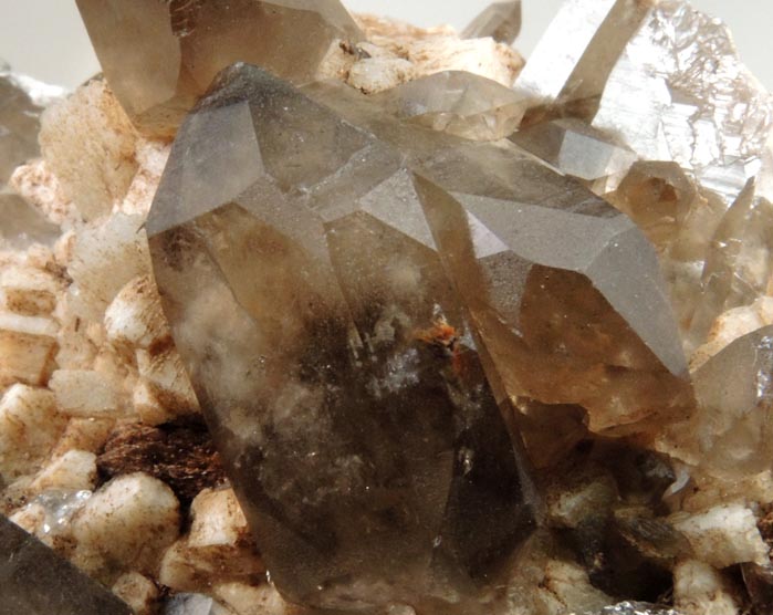 Quartz var. Smoky Quartz (Dauphin-law twins) on Microcline from Moat Mountain, west of North Conway, Carroll County, New Hampshire