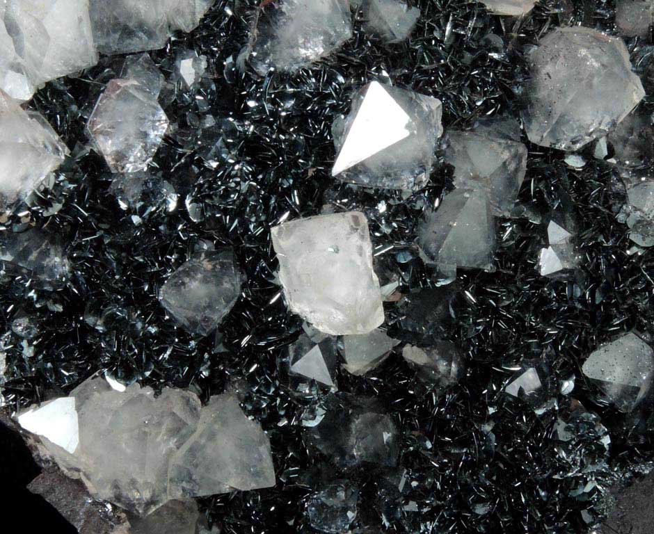 Quartz (di-pyramidal habit) on specular Hematite from Cumberland Iron Mining District, Cumbria, England