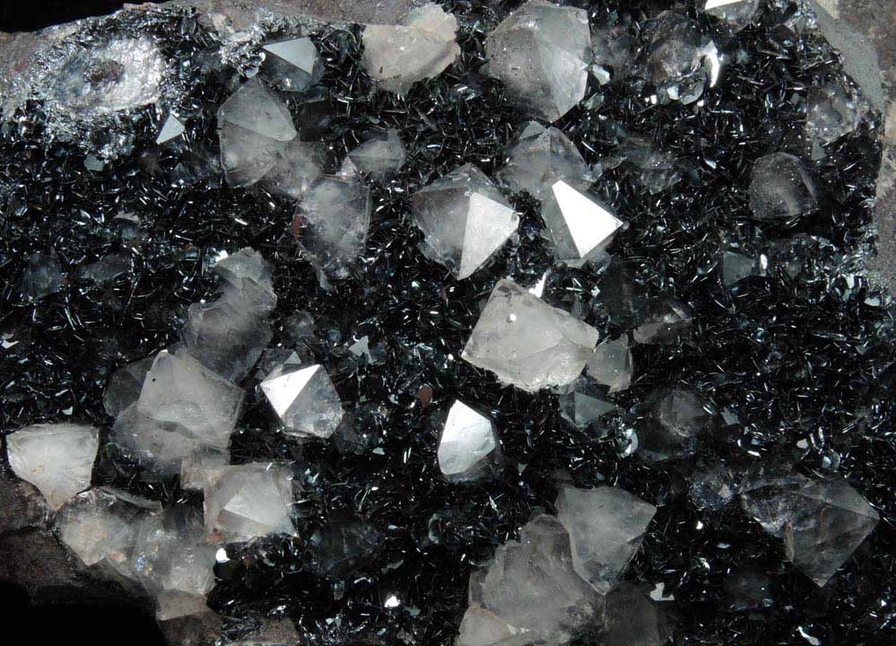 Quartz (di-pyramidal habit) on specular Hematite from Cumberland Iron Mining District, Cumbria, England