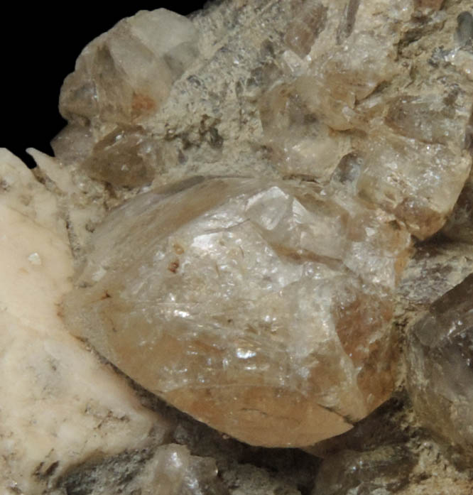 Hydroxylherderite on Muscovite and Albite from Mount Apatite, Auburn, Androscoggin County, Maine