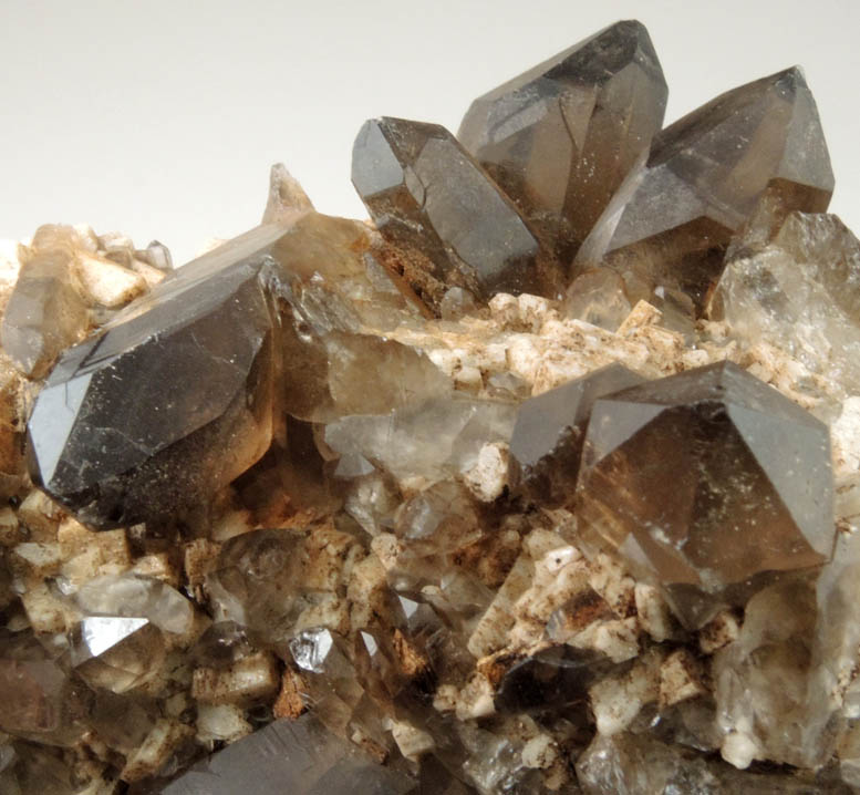 Quartz var. Smoky Quartz (Dauphin-law twins) on Microcline from Moat Mountain, west of North Conway, Carroll County, New Hampshire