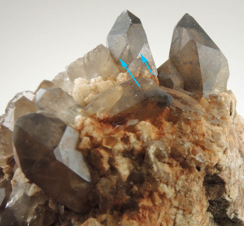 Quartz var. Smoky Quartz (Dauphin-law twins) on Microcline from Moat Mountain, west of North Conway, Carroll County, New Hampshire