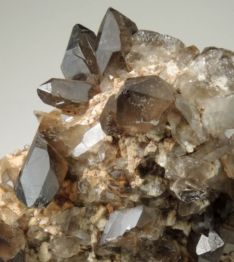 Quartz var. Smoky Quartz (Dauphin-law twins) on Microcline from Moat Mountain, west of North Conway, Carroll County, New Hampshire