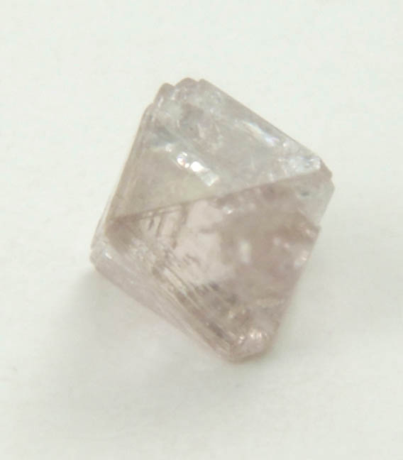 Diamond (0.19 carat pink-gray octahedral crystal) from Argyle Mine, Kimberley, Western Australia, Australia