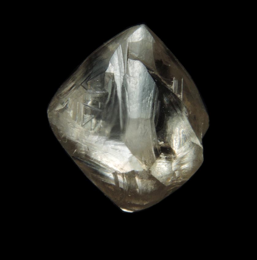 Diamond (1.94 carat yellow-gray octahedral crystal) from Damtshaa Mine, near Orapa, Botswana