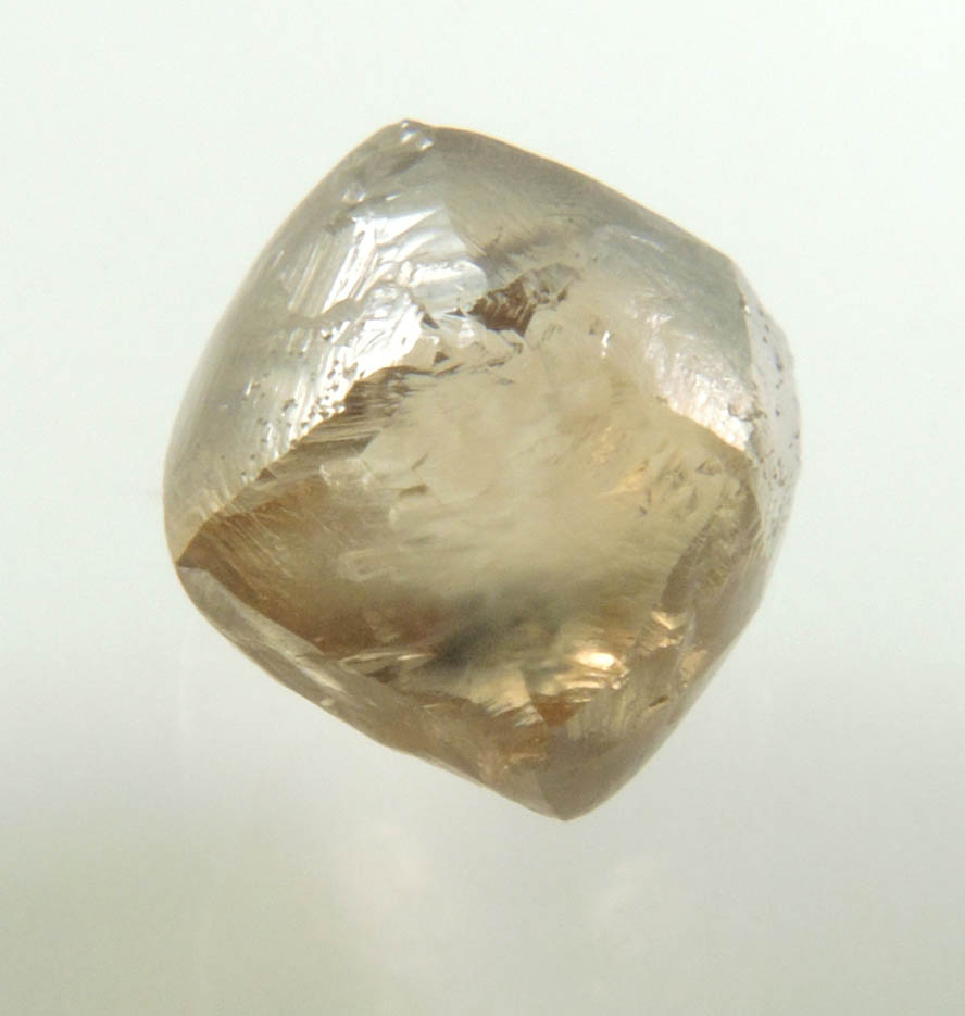 Diamond (2.57 carat brown complex rough diamond) from Damtshaa Mine, near Orapa, Botswana