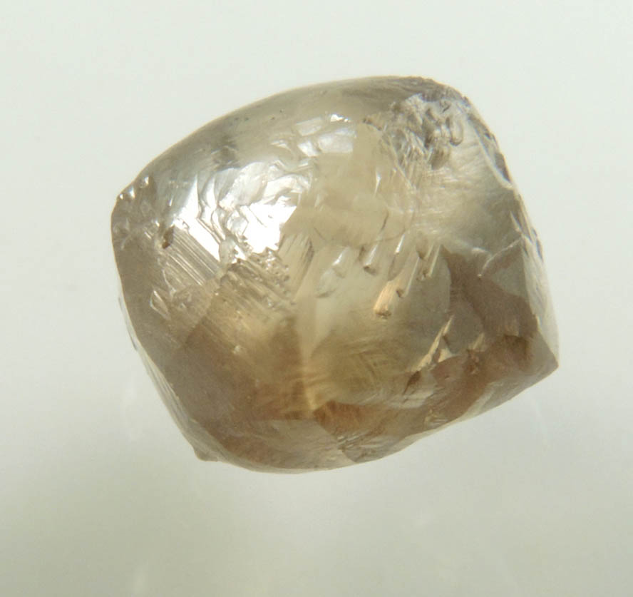 Diamond (2.57 carat brown complex rough diamond) from Damtshaa Mine, near Orapa, Botswana