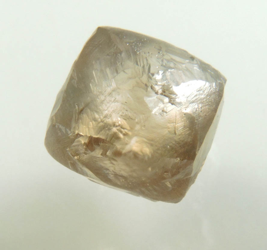 Diamond (2.57 carat brown complex rough diamond) from Damtshaa Mine, near Orapa, Botswana