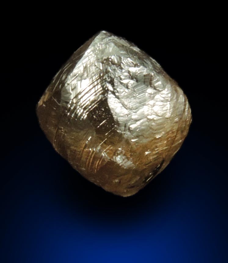 Diamond (2.36 carat gray-brown dodecahedral rough uncut diamond) from Damtshaa Mine, near Orapa, Botswana