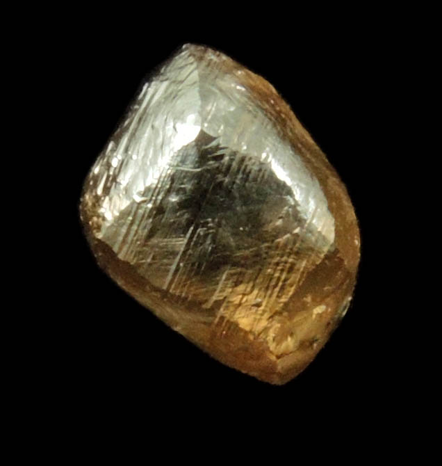 Diamond (2.36 carat gray-brown dodecahedral rough uncut diamond) from Damtshaa Mine, near Orapa, Botswana