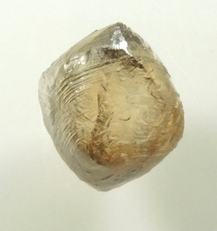 Diamond (2.36 carat gray-brown dodecahedral rough uncut diamond) from Damtshaa Mine, near Orapa, Botswana