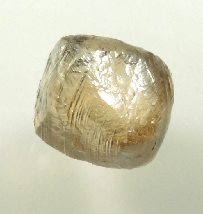 Diamond (2.36 carat gray-brown dodecahedral rough uncut diamond) from Damtshaa Mine, near Orapa, Botswana