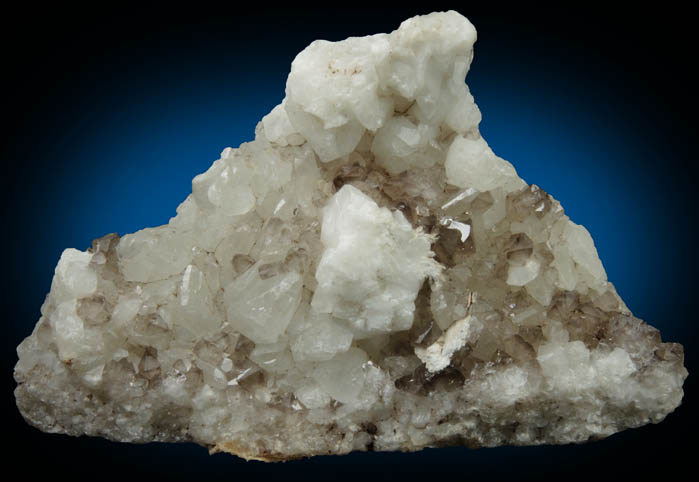 Calcite, Smoky Quartz, Palygorskite from Connecticut Agstone Quarry, Danbury, Fairfield County, Connecticut