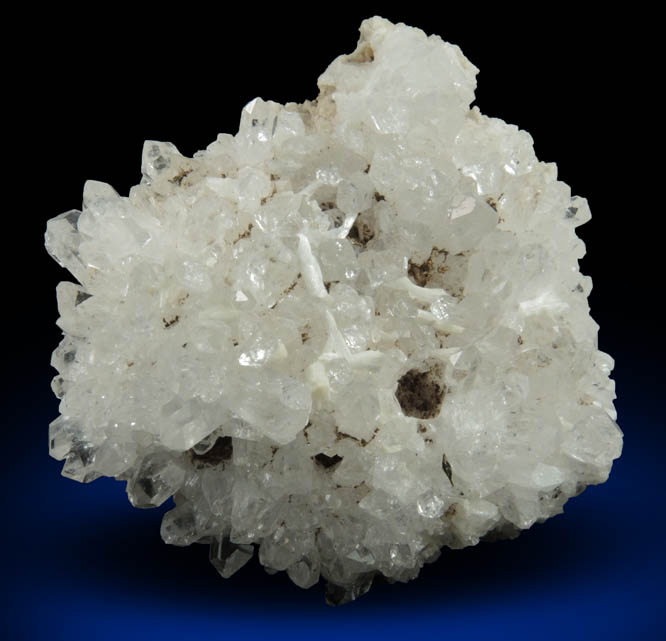 Laumontite on Quartz with pseudomorphic cavities from Upper New Street Quarry, Passaic County, New Jersey