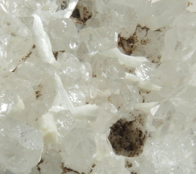 Laumontite on Quartz with pseudomorphic cavities from Upper New Street Quarry, Passaic County, New Jersey