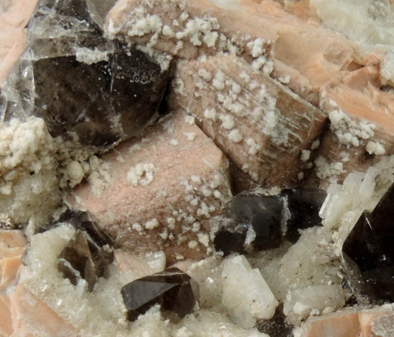 Microcline, Albite, Smoky Quartz, Hyalite Opal from Moat Mountain, on the trail above the Oliver Diggings, Hale's Location, west of North Conway, Carroll County, New Hampshire