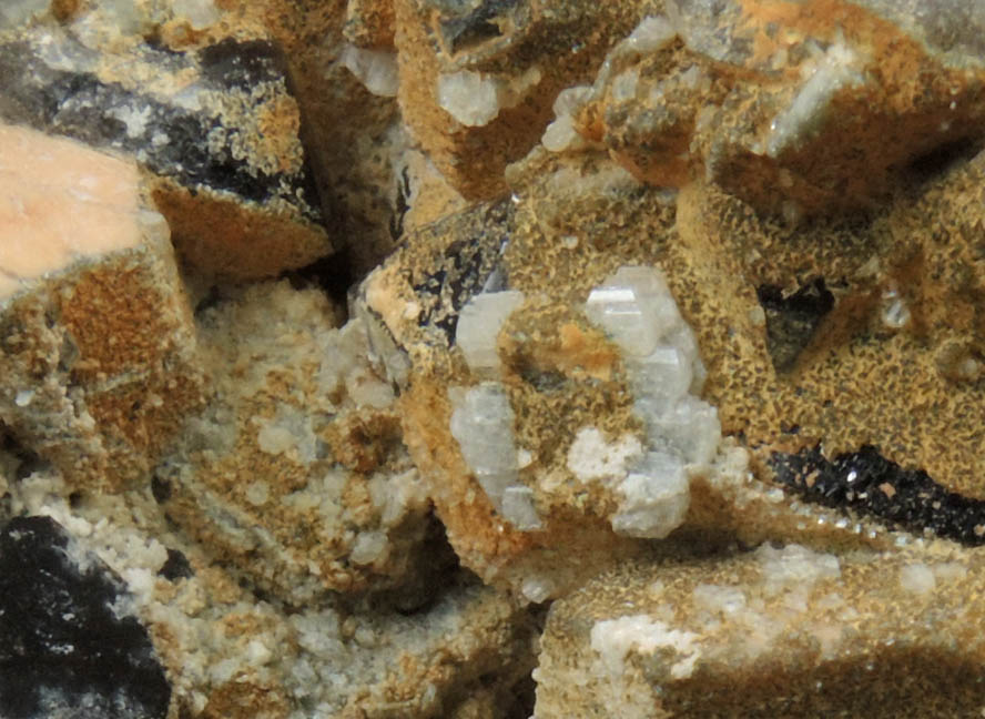 Microcline, Albite, Smoky Quartz, Hyalite Opal from Moat Mountain, on the trail above the Oliver Diggings, Hale's Location, west of North Conway, Carroll County, New Hampshire