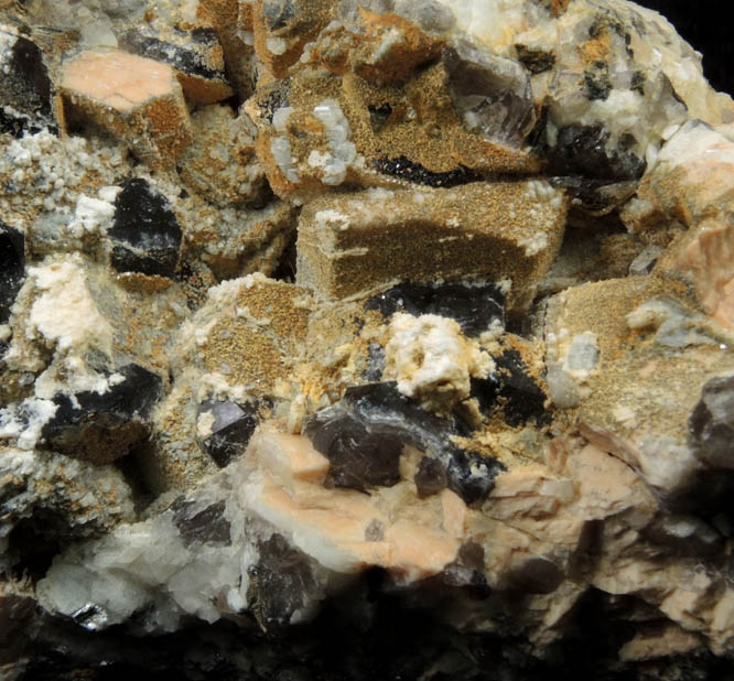 Microcline, Albite, Smoky Quartz, Hyalite Opal from Moat Mountain, on the trail above the Oliver Diggings, Hale's Location, west of North Conway, Carroll County, New Hampshire