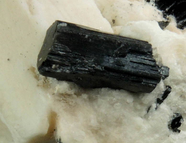 Arfvedsonite (rare terminated Arfvedsonite crystal) on Microcline with Zircon from Hurricane Mountain, east of Intervale, Carroll County, New Hampshire
