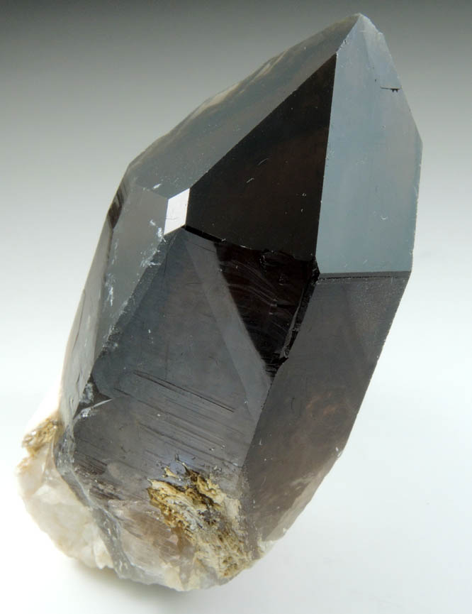 Quartz var. Smoky Quartz (Dauphiné-law twin) on Microcline from Moat Mountain, west of North Conway, Carroll County, New Hampshire