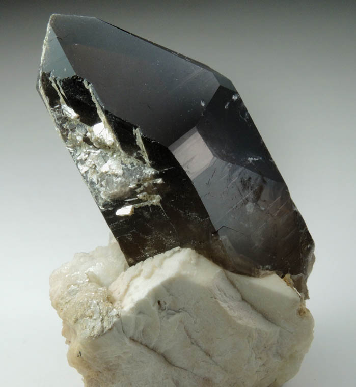 Quartz var. Smoky Quartz (Dauphin-law twin) on Microcline from Moat Mountain, west of North Conway, Carroll County, New Hampshire