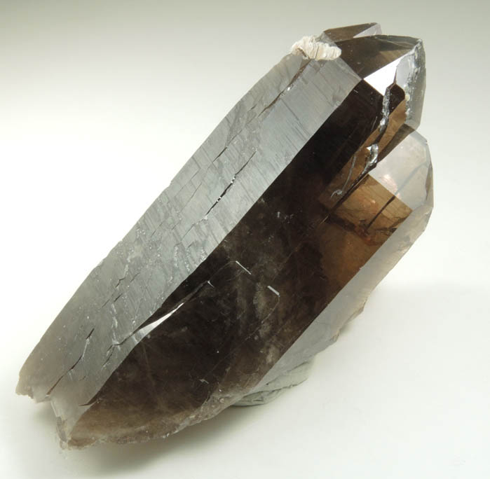 Quartz var. Smoky Quartz (Dauphin-law twin) with Muscovite from Moat Mountain, west of North Conway, Carroll County, New Hampshire