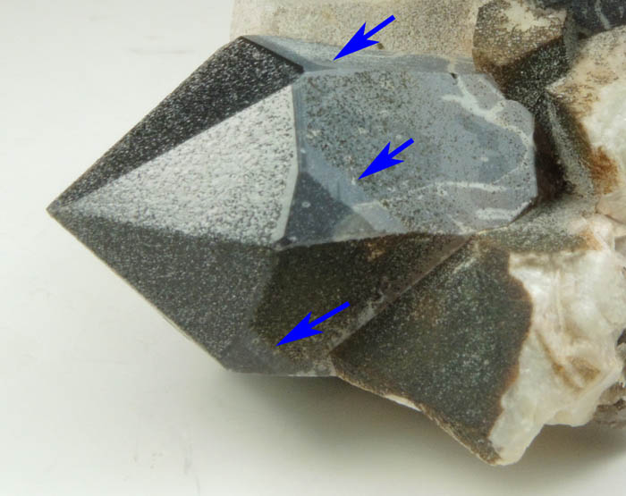 Quartz var. Smoky Quartz (Dauphin-law twin) on Microcline from Hurricane Mountain, east of Intervale, Carroll County, New Hampshire