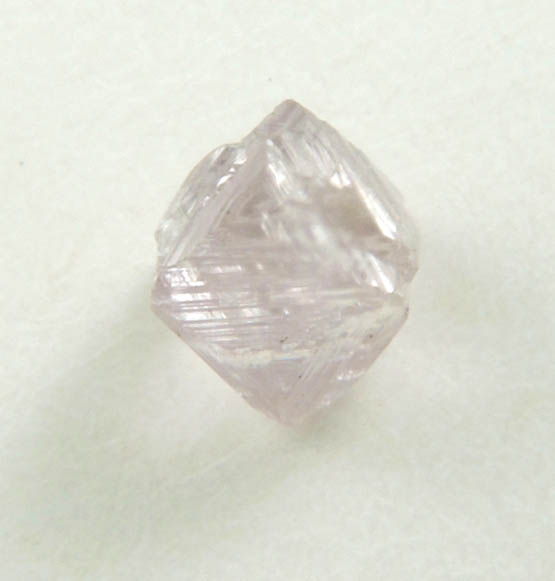 Diamond (0.20 carat pink-gray octahedral crystal) from Argyle Mine, Kimberley, Western Australia, Australia