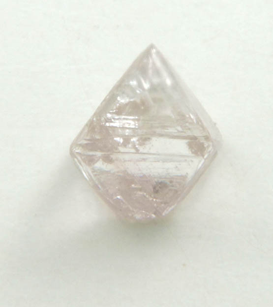 Diamond (0.28 carat pink-gray octahedral crystal) from Argyle Mine, Kimberley, Western Australia, Australia