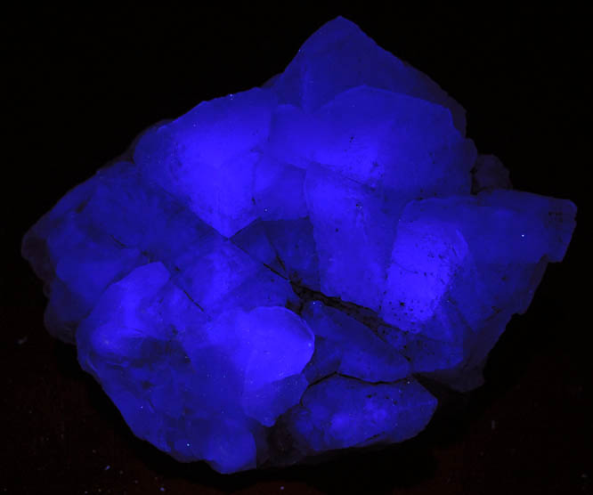 Photo below under longwave ultraviolet illumination of Fluorite from William Wise Mine, Westmoreland, Cheshire County, New Hampshire Fluorite from William Wise Mine, Westmoreland, Cheshire County, New Hampshire