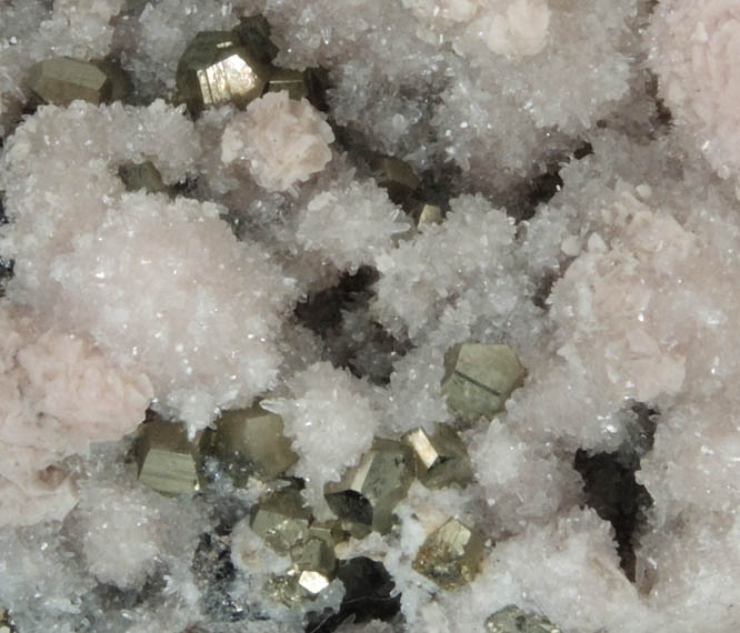 Rhodochrosite with Pyrite on Quartz from Raura District, Cajatambo Province, Peru