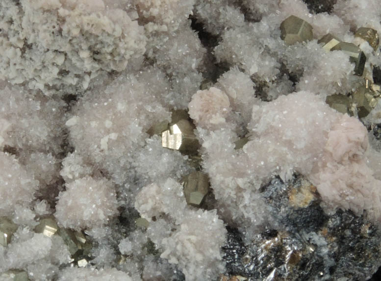 Rhodochrosite with Pyrite on Quartz from Raura District, Cajatambo Province, Peru