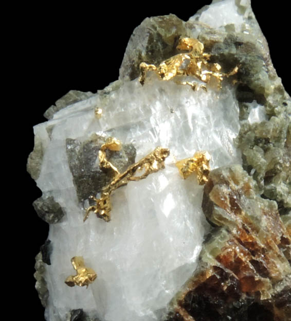 Gold in Calcite and Andradite-Grossular garnet from San Pedro Mine, New Placers District, Santa Fe County, New Mexico