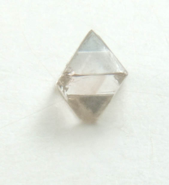 Diamond (0.07 carat pale-brown octahedral crystal) from Mirny, Sakha (Yakutia) Republic, Siberia, Russia