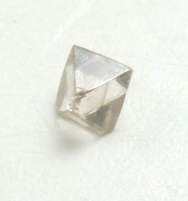 Diamond (0.07 carat pale-brown octahedral crystal) from Mirny, Sakha (Yakutia) Republic, Siberia, Russia