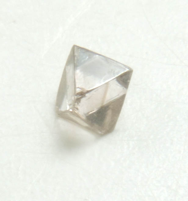 Diamond (0.07 carat pale-brown octahedral crystal) from Mirny, Sakha (Yakutia) Republic, Siberia, Russia