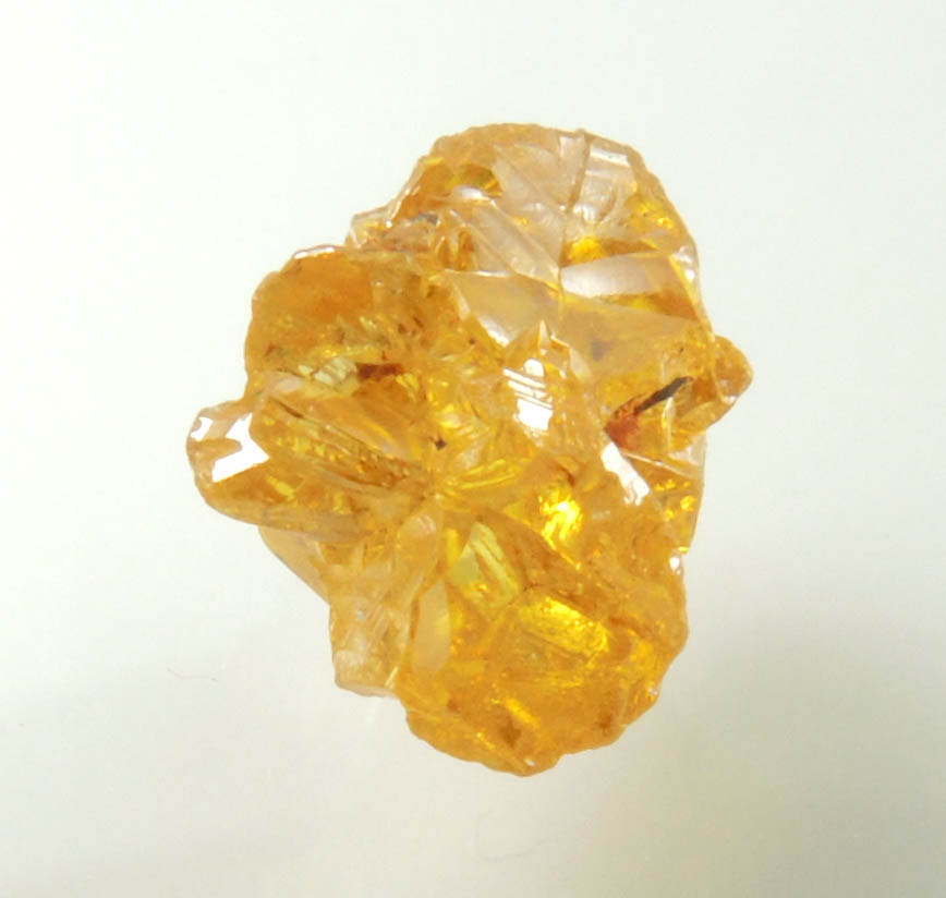 Diamond (1.35 carat cluster of fancy intense brownish-yellow cavernous uncut diamonds) from Mbuji-Mayi, 300 km east of Tshikapa, Democratic Republic of the Congo