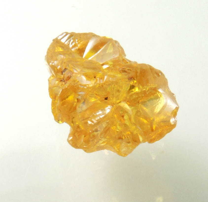 Diamond (1.35 carat cluster of fancy intense brownish-yellow cavernous uncut diamonds) from Mbuji-Mayi, 300 km east of Tshikapa, Democratic Republic of the Congo