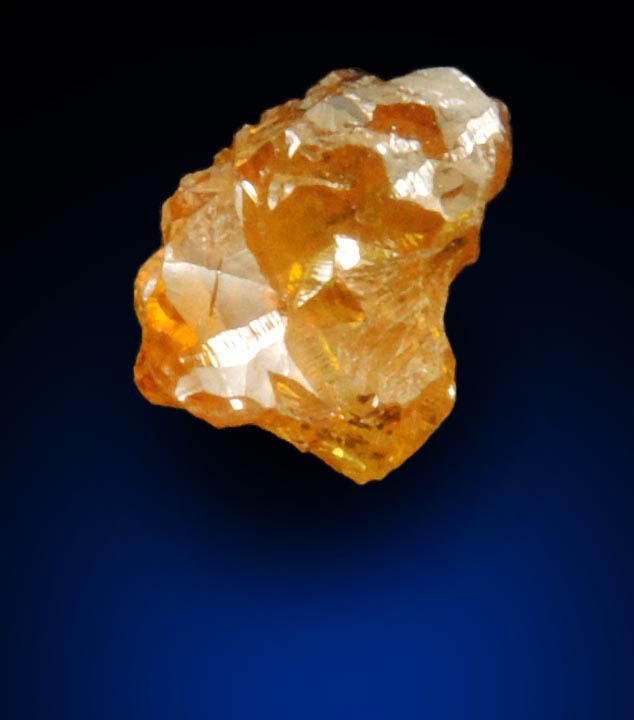 Diamond (0.65 carat fancy intense brownish-yellow cavernous uncut diamond) from Mbuji-Mayi, 300 km east of Tshikapa, Democratic Republic of the Congo