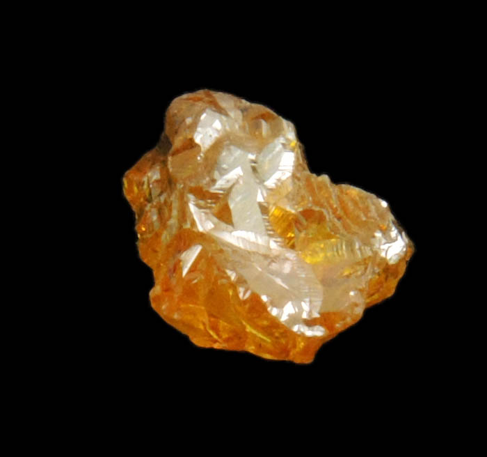 Diamond (0.65 carat fancy intense brownish-yellow cavernous uncut diamond) from Mbuji-Mayi, 300 km east of Tshikapa, Democratic Republic of the Congo