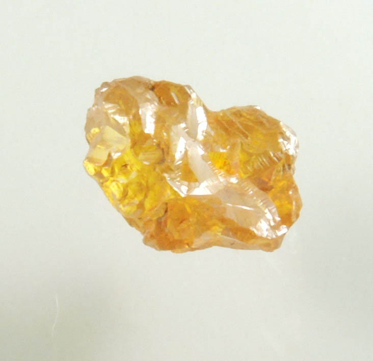 Diamond (0.65 carat fancy intense brownish-yellow cavernous uncut diamond) from Mbuji-Mayi, 300 km east of Tshikapa, Democratic Republic of the Congo