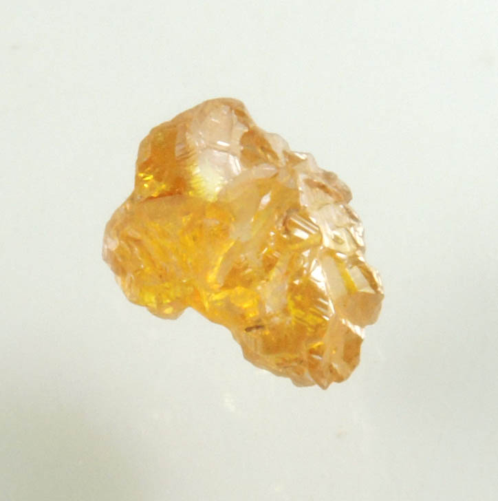 Diamond (0.65 carat fancy intense brownish-yellow cavernous uncut diamond) from Mbuji-Mayi, 300 km east of Tshikapa, Democratic Republic of the Congo