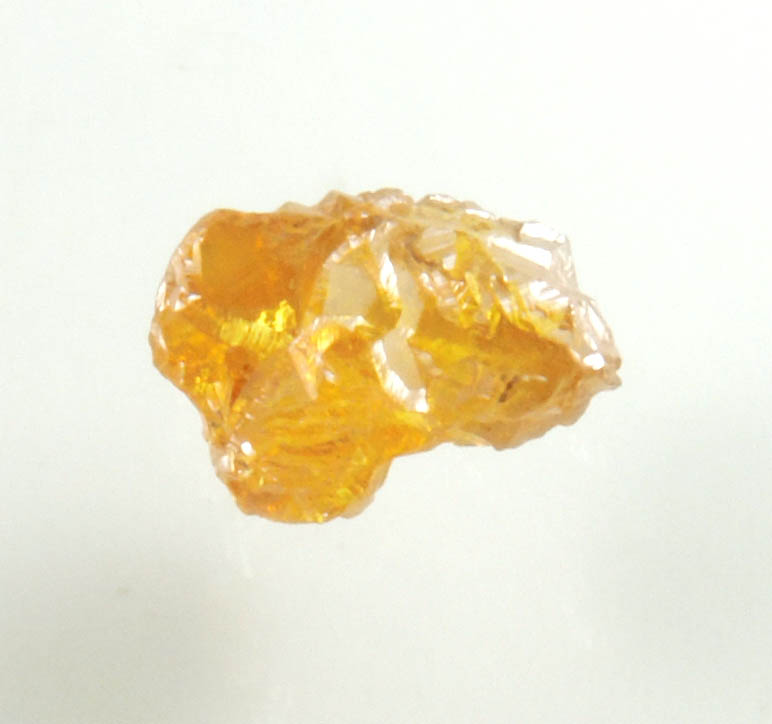 Diamond (0.65 carat fancy intense brownish-yellow cavernous uncut diamond) from Mbuji-Mayi, 300 km east of Tshikapa, Democratic Republic of the Congo
