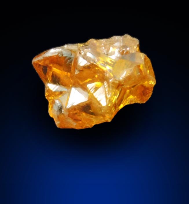 Diamond (0.65 carat fancy intense brownish-yellow cavernous rough diamond) from Mbuji-Mayi, 300 km east of Tshikapa, Democratic Republic of the Congo