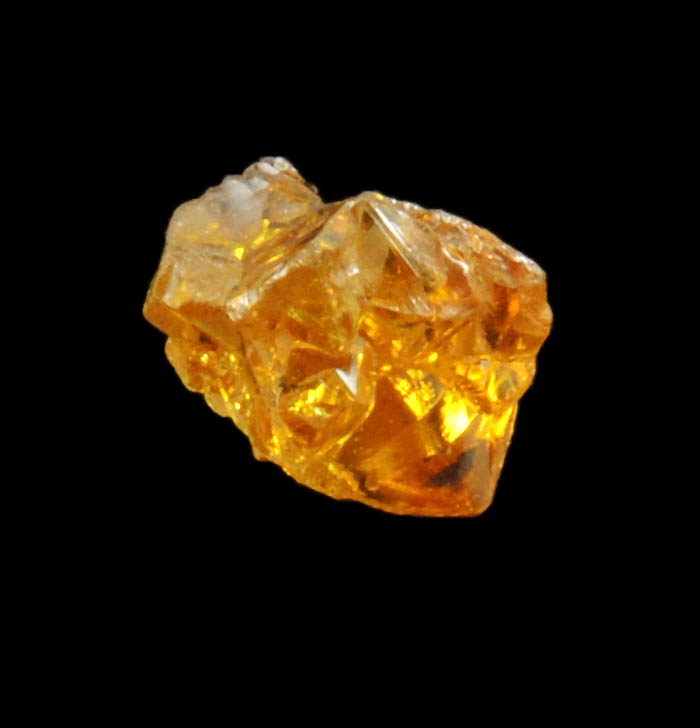 Diamond (0.65 carat fancy intense brownish-yellow cavernous rough diamond) from Mbuji-Mayi, 300 km east of Tshikapa, Democratic Republic of the Congo