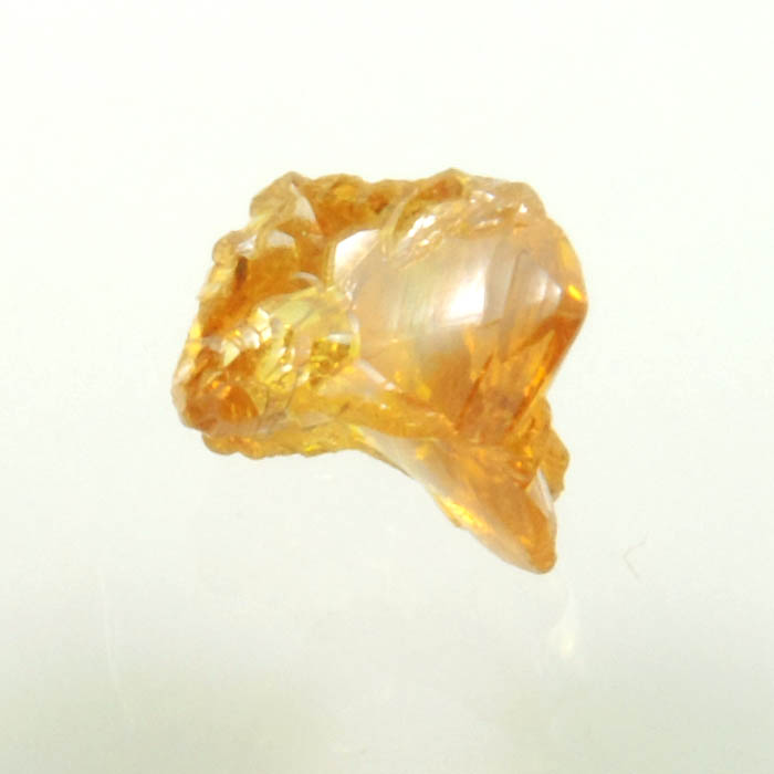 Diamond (0.65 carat fancy intense brownish-yellow cavernous rough diamond) from Mbuji-Mayi, 300 km east of Tshikapa, Democratic Republic of the Congo