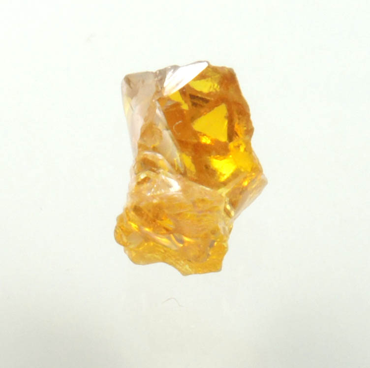 Diamond (0.65 carat fancy intense brownish-yellow cavernous rough diamond) from Mbuji-Mayi, 300 km east of Tshikapa, Democratic Republic of the Congo